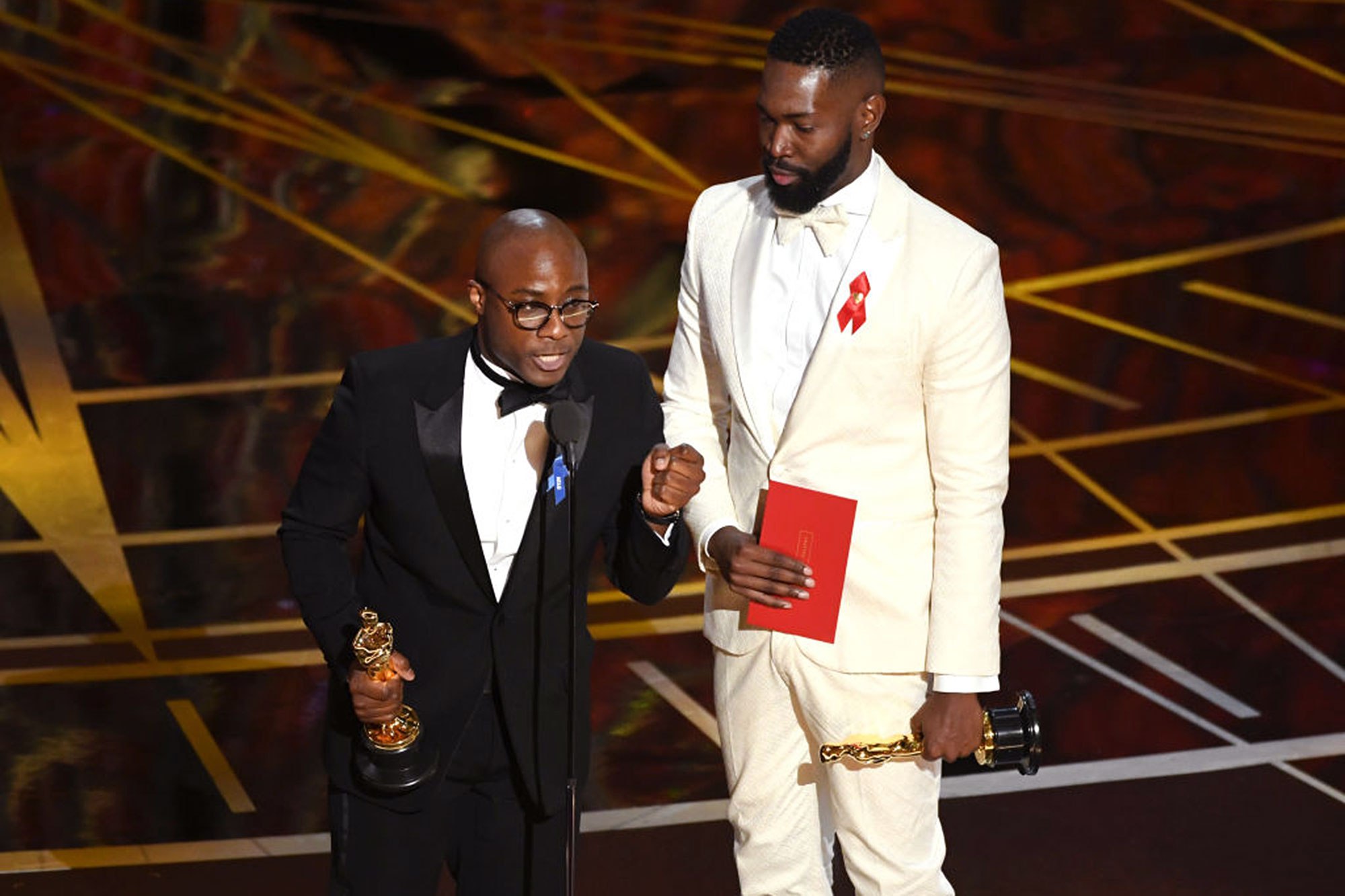 HOLLYWOOD, CA - FEBRUARY 26: Writer/director Barry Jenkins (L) and writer Tarell Alvin McCraney accept Best Adapted Screenplay for 'Moonlight' onstage during the 89th Annual Academy Awards at Hollywood & Highland Center on February 26, 2017 in Hollywood, California. (Photo by Kevin Winter/Getty Images)