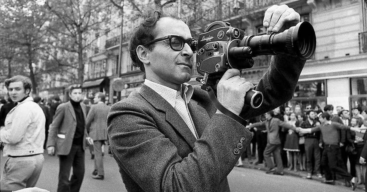 Jean-Luc Godard with a film camera. 